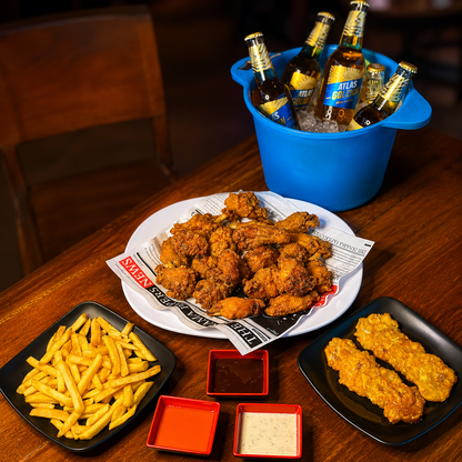 Todas Las Alitas Que Puedas Comer por 1 Hora para 2 Personas + Bebidas por $12 en El Barrilazo