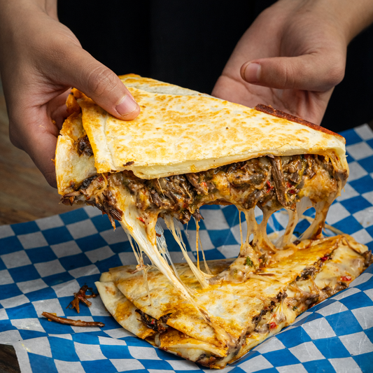 2 Quesadillas + Nachos + 2 Bebidas y 2 Helados por solo $15 en Feelings Flavours