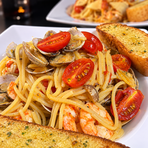 Paga $18 y Disfruta $30 en el Menú de Comidas en Pizzarella – Costa del Este y Vía Israel