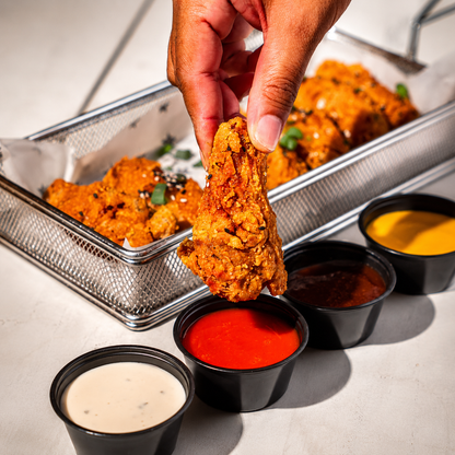 All You Can Eat de Wings, Tenders y Hamburguesitas para 2 por $20 en Beauty and the Butcher