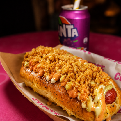 2 Coyote Dogs Sencillos + 2 Sodas por solo $10 en Coyote Brisas del Golf