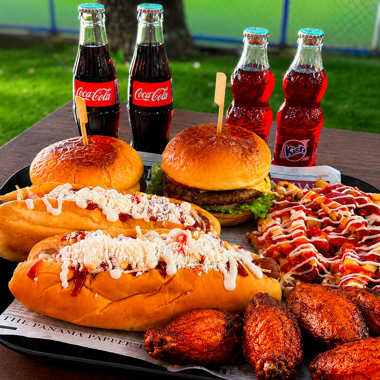2 Burgers de Carne + 2 Hot Dogs Jumbo, Wings y 4 Sodas por solo $15 en Bokattos