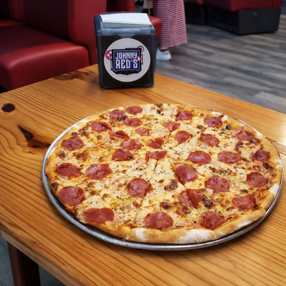 1 Pizza Familiar + 1 Cubetazo de Cerveza por $12 en Johnny and Red’s