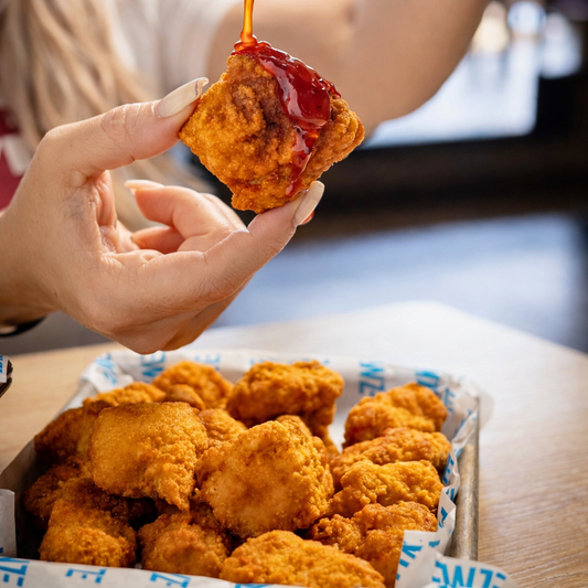 20 Wings o Boneless + 2 Quesadillas + 2 Sides + 2 Sodas por $25 en Wing Zone El Dorado