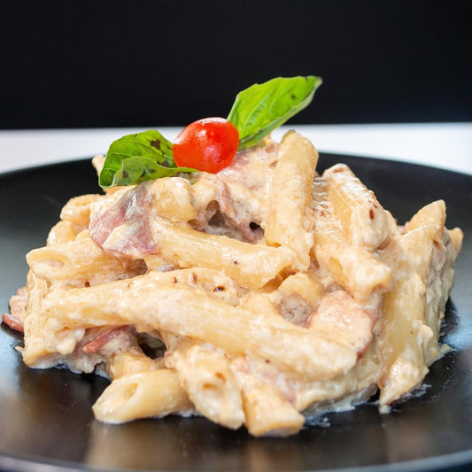 Pizza Carnívora 10” + Pasta Carbonara + 2 Bebidas por solo $18 en Pronto Pizza